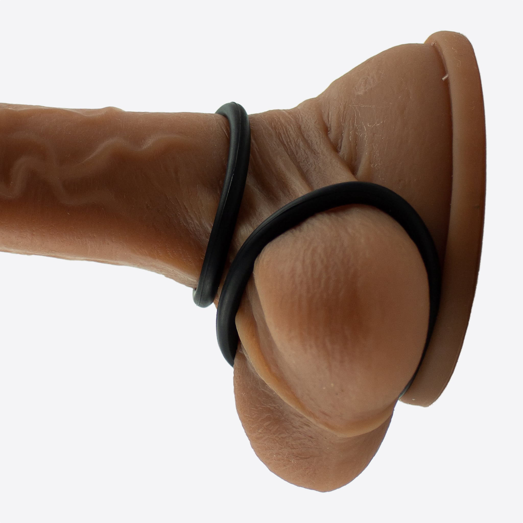 Unilove Basics penisring sæt 3 stk illustreret på en penis